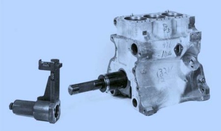 Centerline of an engine crankshaft bore was established through the use of a ball arbor. The face squareness attachment at left, when placed on the arbor, checked the squareness of critical surfaces with respect to the crankshaft bore